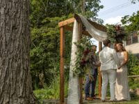 outdoor ceremony near the singing frog pond